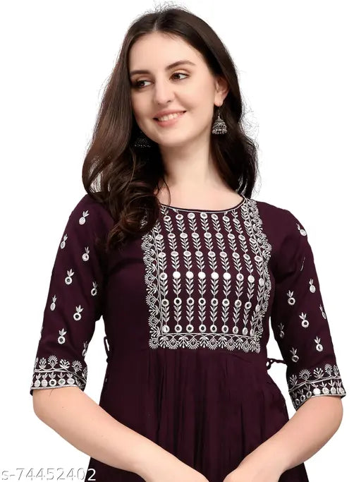 Embroidered rayon kurta in classic colors, three-quarter sleeves. Casual or festive wear for work or parties with a relaxed fit. Machine washable