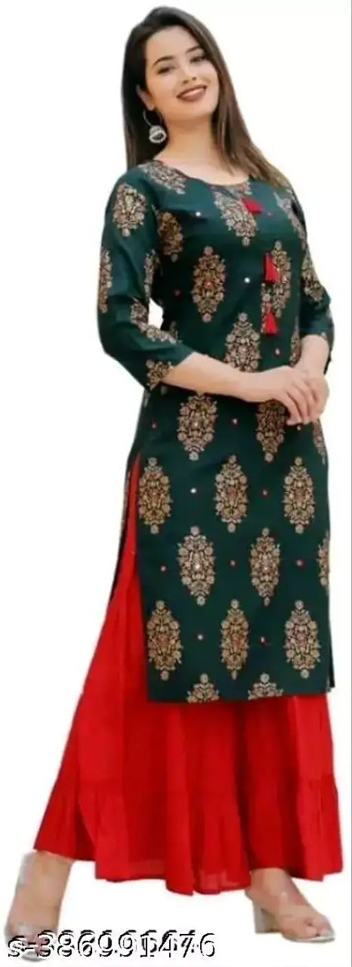 Woman in dark blue embroidered kameez and red skirt