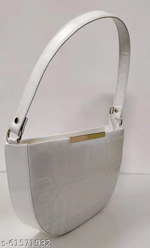 Silver metal purse with a single long strap and small slit pocket on the front