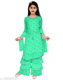 Green partywear dress with ruffled sleeves and a scoop neck, worn by a young girl in casual pose