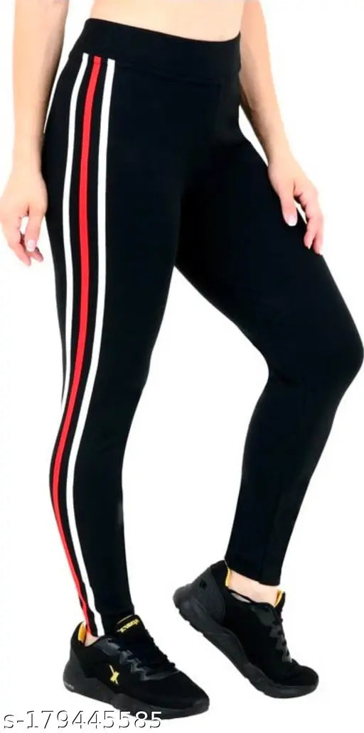 Black cotton blend YogaSports Jeggings with ankle fit type, suitable for sports and yoga. High stretchable and skinny fit, soft and comfortable. Available in multiple colors. Pack of 1pc. Sizes: 28, 30, 32 (Waist 28/30/32, Length 36in, Hip 28/30/32). Made in India