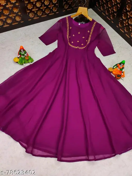 Purple hand-embroidered kameez with intricate details, likely made of silk or a similar fabric, and featuring long sleeves and a round neckline