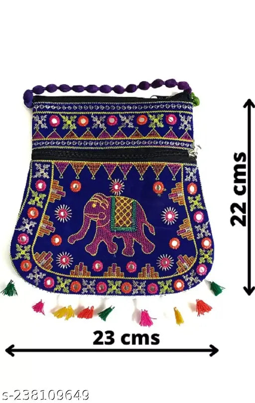 Blue sling bag with embroidered elephant design, adjustable strap