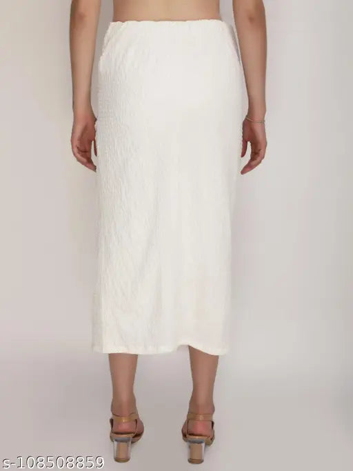 White polyester textured side slit skirt for women, trendy and suitable for parties or festive occasions. Skirt features a solid design with a size 26 waist (26in) and length size 25in. Made in India