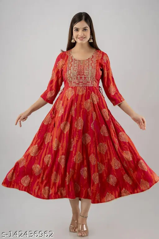 Women's long, embroidered anarkali kurta in orange and pink with gold print detailing