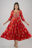 Women's long, embroidered anarkali kurta in orange and pink with gold print detailing
