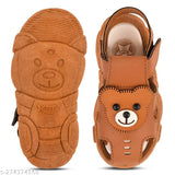 Brown suede sandals with cartoon character embellishment, teddy bear design
