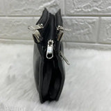 Black artificial leather clutch with multiple pockets, silver zipper pulls