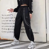 Hip hop style streetwear joggers in black with chains and a drawstring waistband