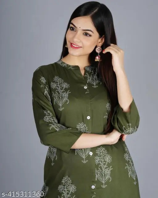 Women's rayon printed high slit kurti-like gown with three-quarter sleeves, featuring a pocket design. Available in sizes S to XXXL for bust sizes ranging from 36in to 46in and a length of 46in. Origin: India
