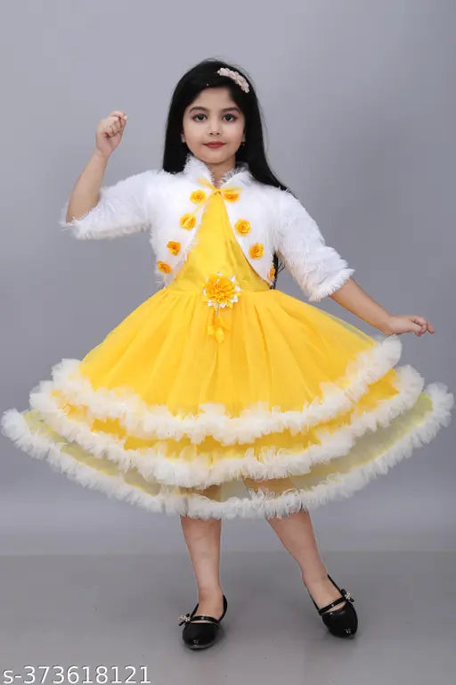 Green printed net Barbie Girls below knee festive/wedding dress with three-quarter sleeves from Jhilik Garments, suitable for parties or play