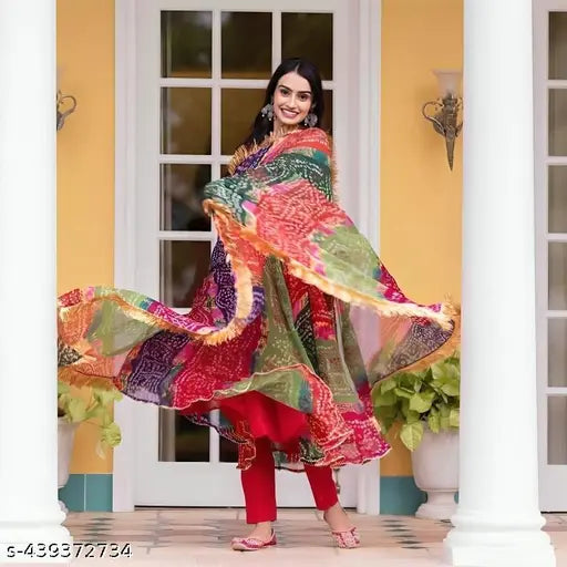 Vibrant synthetic multicolor Delta gown with matching fringe-trimmed dupatta, ideal for festive occasions