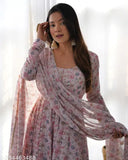 Pink anarkali dance outfit, heavy orange chiffon floral print Chhath Puja special designer suit. Traditional Kashmiri Phiran with padded churidar sleeves and padded lining." (120 characters)