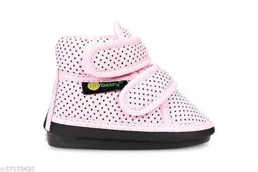 Pink polka dot baby shoes with casual design and foot support