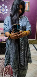 Printed rayon kaftan and Palazzo set with intricate lace detailing, shimmering embellishments, and three-quarter sleeves. Indian ethnic fashion for weddings, complete with earrings and Kohlapuri juttis
