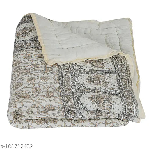Cream and gold printed satin blanket with a quilted design, 152cm x 228.6cm