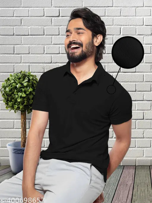 Black polocotton blend dot knit t-shirt with collar neck, for men and women. Solid pattern, short sleeves, S size (36in chest, 25in length)