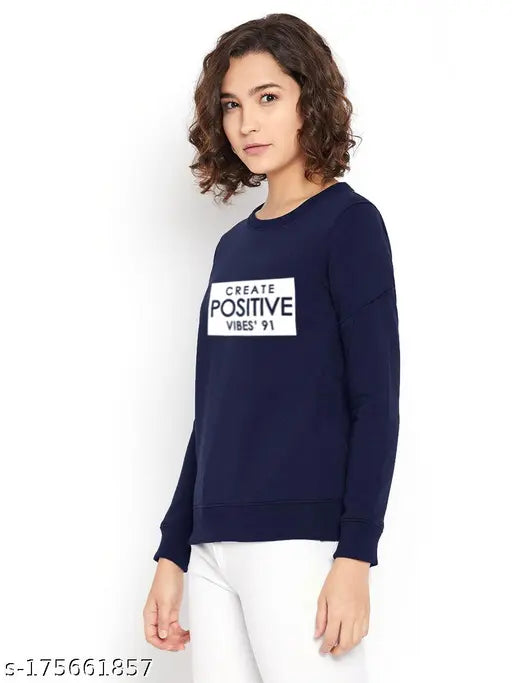 Blue fleece printed sweatshirt, stylish & trendy women's winter wear with positive vibe, round collar and two pockets on display