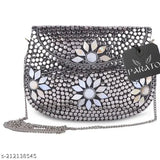 Handcrafted metal clutch with silver floral accents and sling strap