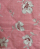 A pink flower pattern quilt, lightweight and breathable, reversible for two different looks