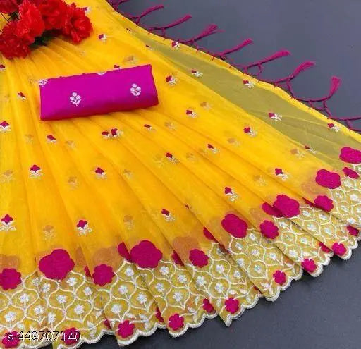 Mustard yellow and off-white Super Net sari with embroidered blouse, showcasing multi-thread embroidery work and cutwork broder on pallu