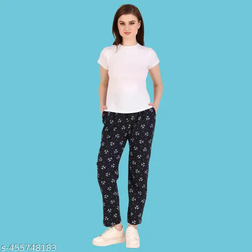 Trendy women's track pants with a navy blue print and white t-shirt