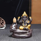 Handcrafted Poly Resin Ganesha Idol with Backflow Incense, 9cm x 10cm x 8cm, comes with 10 back-flow incense cones. Perfect for adding a spiritual touch to your home decor