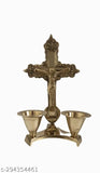 Antique finish brass Christian cross statue with attached candle stand, featuring idol of Jesus Christ. Perfect for prayer and worship decor in home or office. Measures approximately 5 inches tall (13 cm)