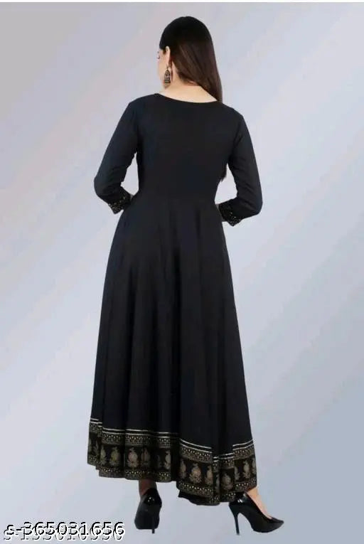 Black garment with long, flowing skirt