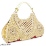 Womens fancy clutch with gold accents and chain design, featuring a red interior