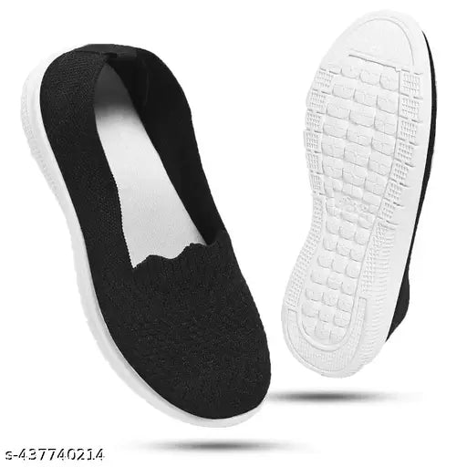 Black, lightweight, comfortable slip-on shoes for women. Summer trendy stylish fashionable footwear for warm weather