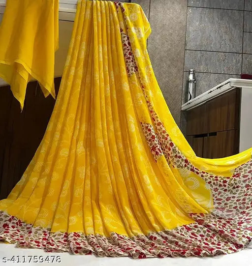 Golden yellow silk saree with blouse, draped in a room