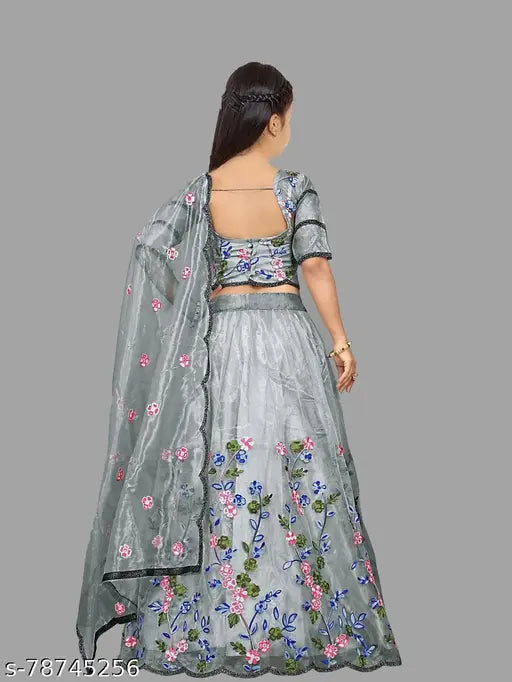 Embroidered cotton kids' lehenga-choli set, long sleeve, semi-stitched, free size, Indian wedding attire on display