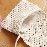 White crocheted purse with a long strap