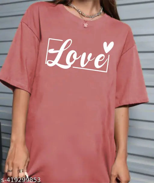 Pink t-shirt with 'Love' in white lettering