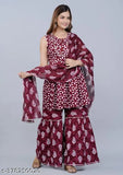 Maroon and white sari with flared bottoms