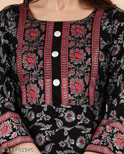 Anarkali top with black background and embroidered floral patterns, short sleeves, zippered front closure