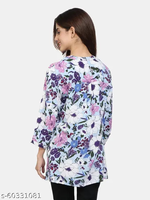 Multicolor floral print rayon lycra women's above-knee dress with mandarin collar and three-quarter sleeves. Made in India