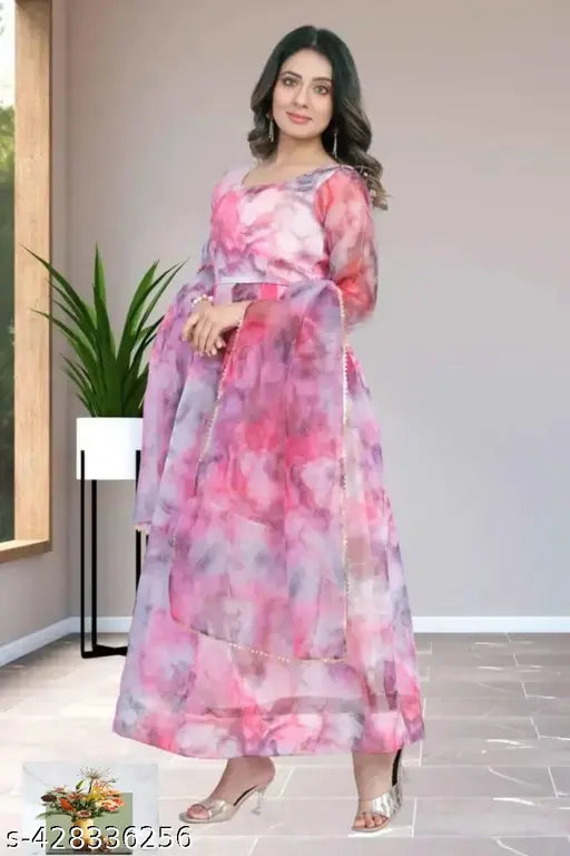 Pink organza floral gown set with rich position print, three-quarter sleeves, India-origin fashion