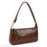 A light brown leather sling bag with adjustable strap