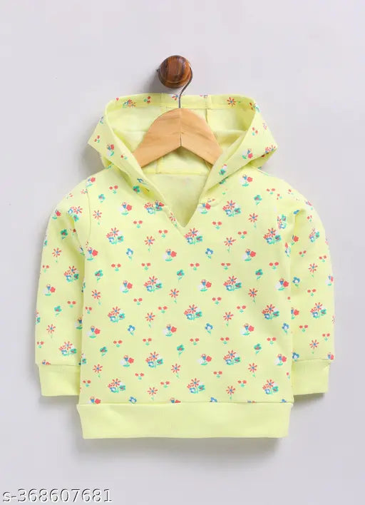 Green Mimino baby girl's allover printed full-sleeve cotton sweatshirt on hanger