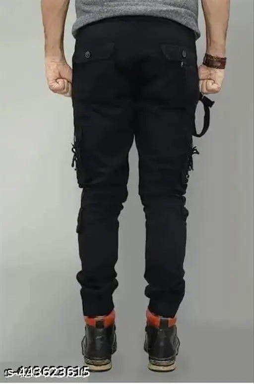 Black trouser with zip fly, elastic waistband and slender fit