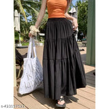 Solid black and white rayon skirt for women, fashionable solid-patterned item on display stand