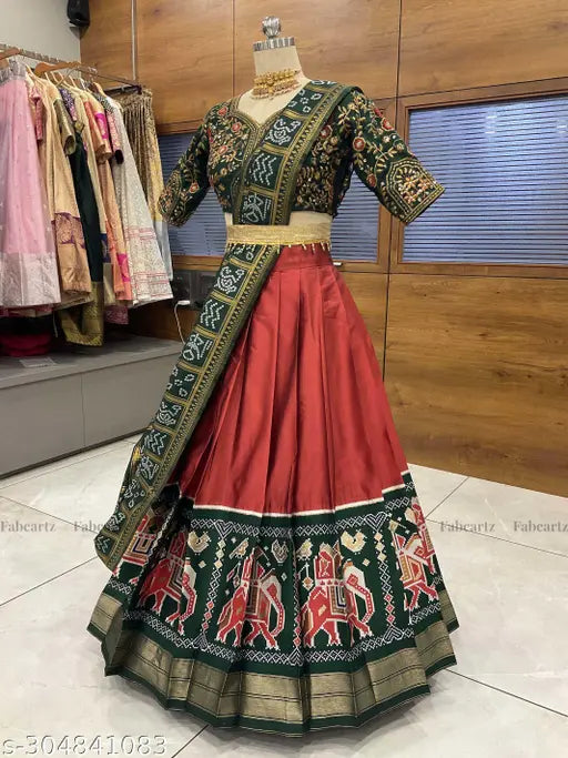 Unstitched Art Silk South Indian style half saree with embroidered lehenga, Ikat dupatta, tussle detail, and included belt. Solid litchi silk zari work." (124 characters)