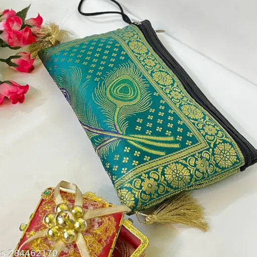 Handcrafted women's wallet with gold and blue designs, black strap