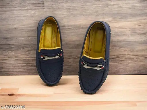 Navy blue loafers with gold accents, lace-up front