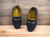 Navy blue loafers with gold accents, lace-up front