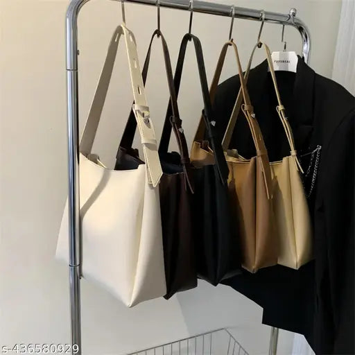 Tan leather shoulder bag with zip closure and multiple card slots