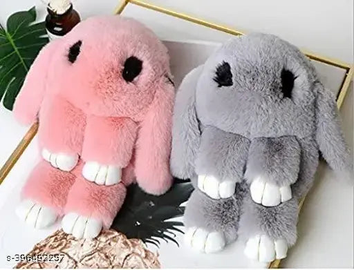 Pink and gray sling bags, featuring faux fur side panels, designed for girls or kids. Crossbody style with chain shoulder straps