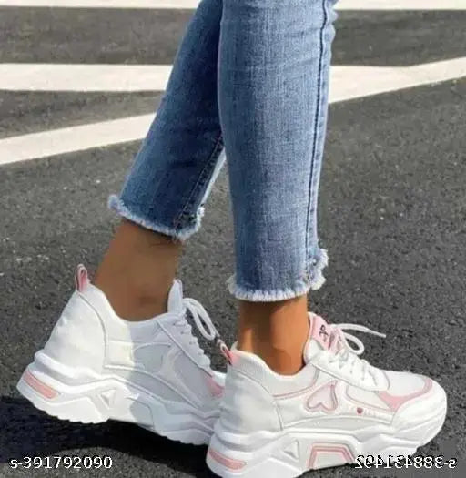 Modern Girls EVA soled sports shoes with striped pattern, lace-up fastening. Breathable air mesh upper for all seasons - new women's running shoes from India